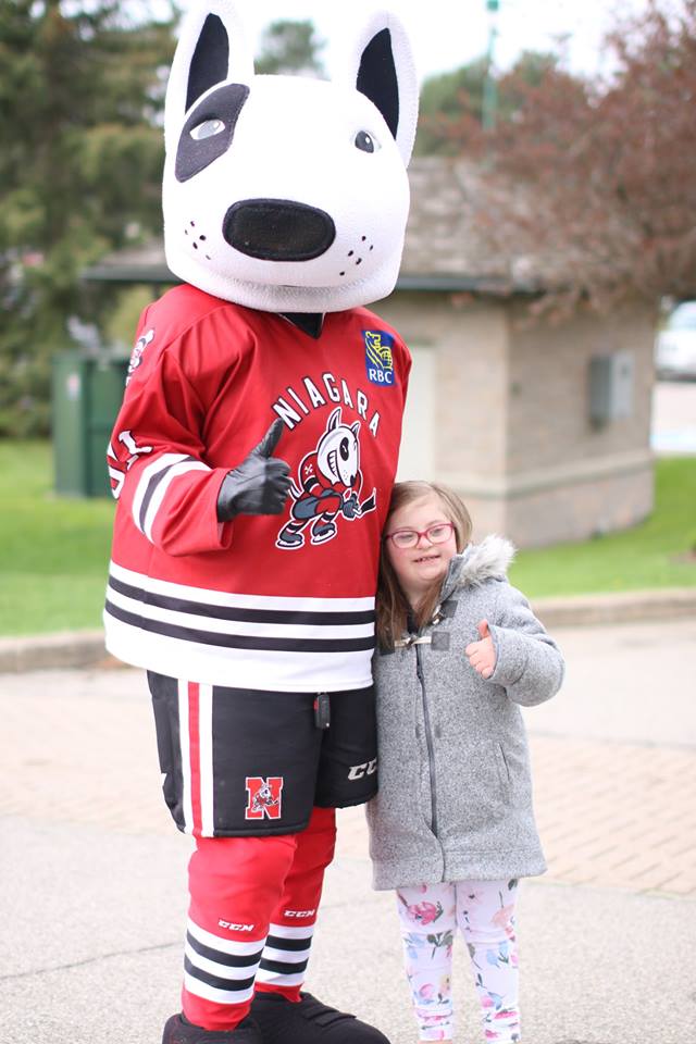 Ice Dogs Mascot Bones with a girl