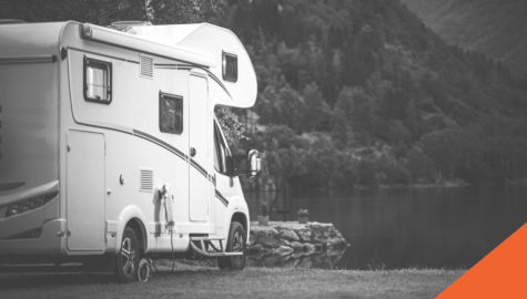 RV Insurance | What Kind of Insurance Do You Need for an RV? | Billyard Insurance Group | Class C RV at a lake 