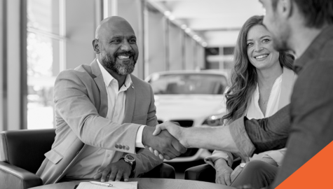 men shaking hands after purchasing a vehicle