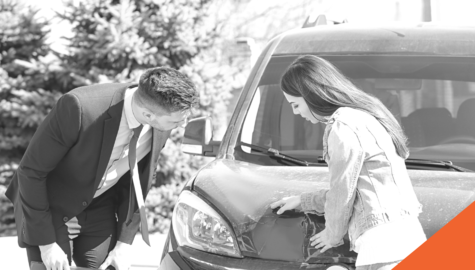 Making An Insurance Claim | Car Accident Two People looking at car | Claims Adjuster | Billyard Insurance Group