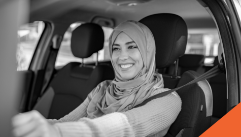 women driving a car