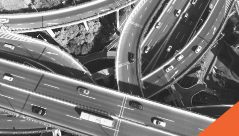 Highway Driving Tips | Billyard Insurance Group | Aerial photo of vehicles driving on highways and overpasses