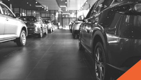 The Latest Information on the Global Car Supply Chain Shortage | cars lined up inside a dealership | Billyard Insurance Group Blog