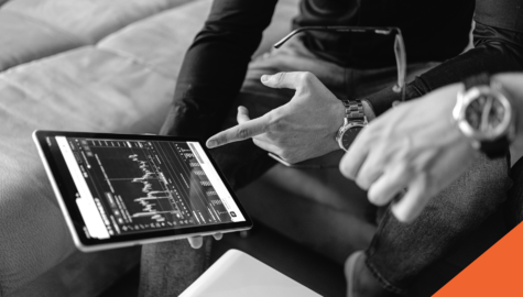 Financial analyst reviewing candlestick patterns.