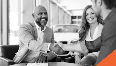 Two people purchasing a new car