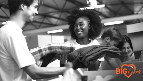 Volunteers Packing Clothing Donations | BIG Hearts Holiday Silent Auction | BIG Hearts