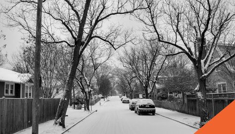 Cars parked on a snowy street