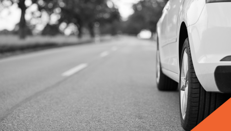 car driving down road