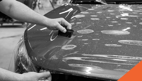 Item scraping hood of modified car
