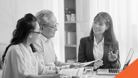Ontario family reviewing auto insurance documents at kitchen table discussing income replacement benefit options before 2026 SABS changes