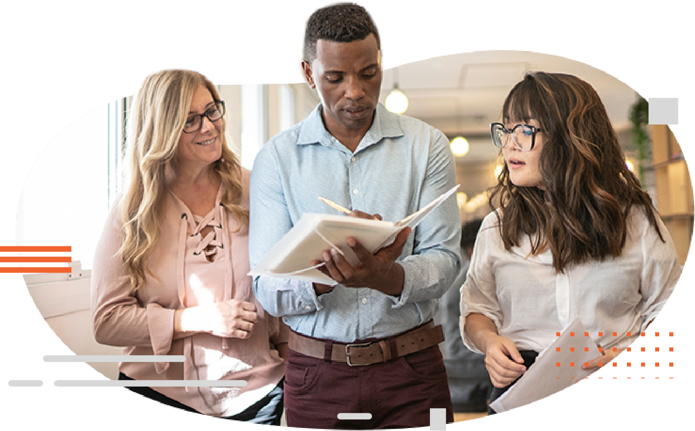 image of person showing notes to colleagues